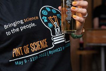Science in the pub, someone drinking beer